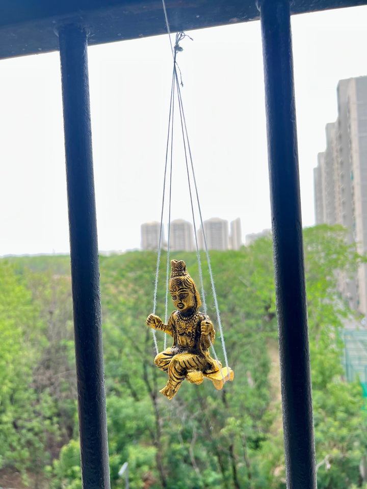 Gold Plated Krishna Idol with attached Jhula