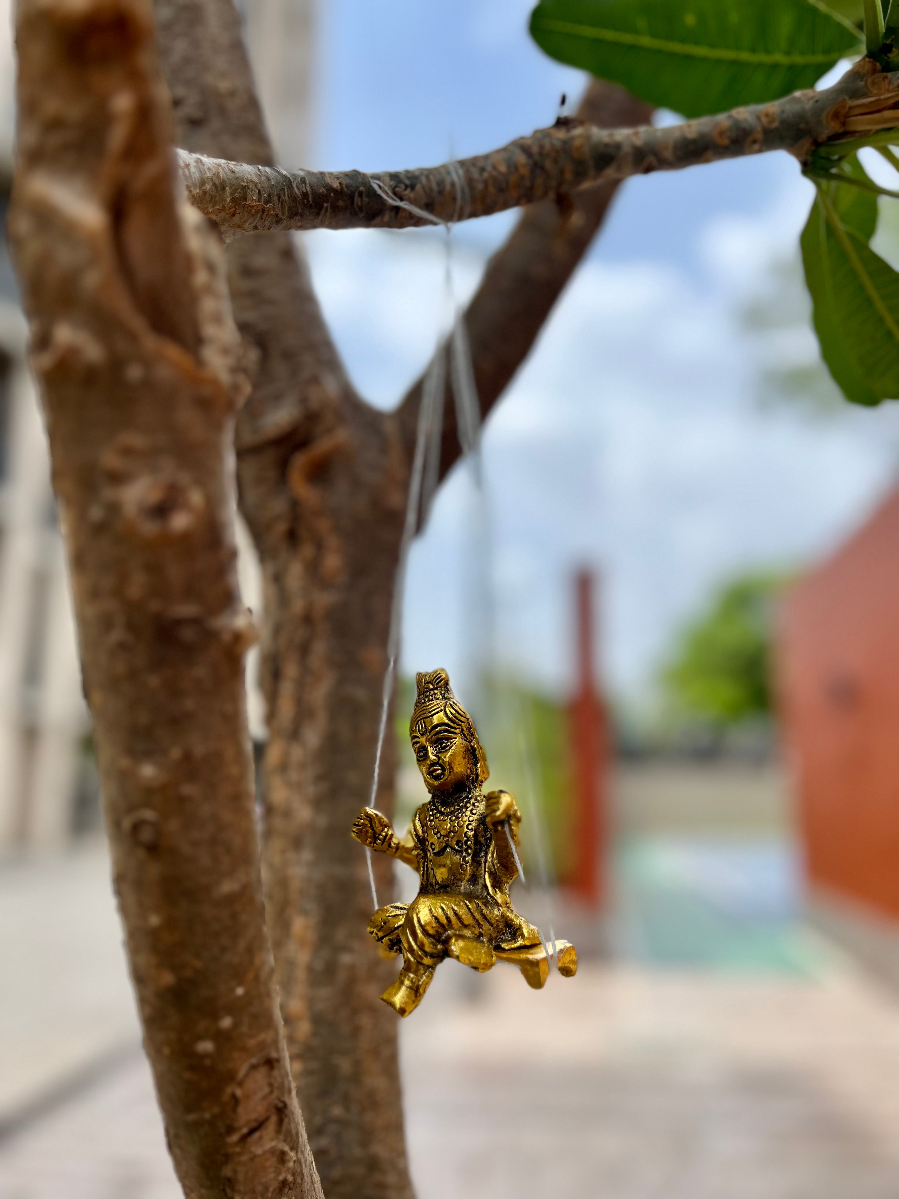 Gold Plated Krishna Idol with attached Jhula