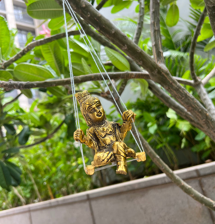 Gold Plated Krishna Idol with attached Jhula